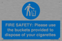 fire-safety-please-use-the-buckets-provided-to-dispose-of-your-cigarettes~